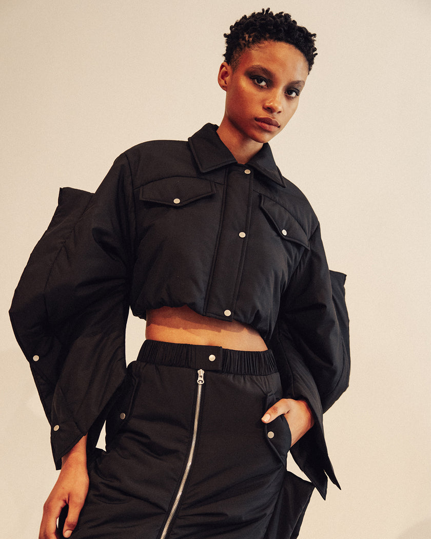 BESFXXK BLACK WAVY BOMBER SKIRTS