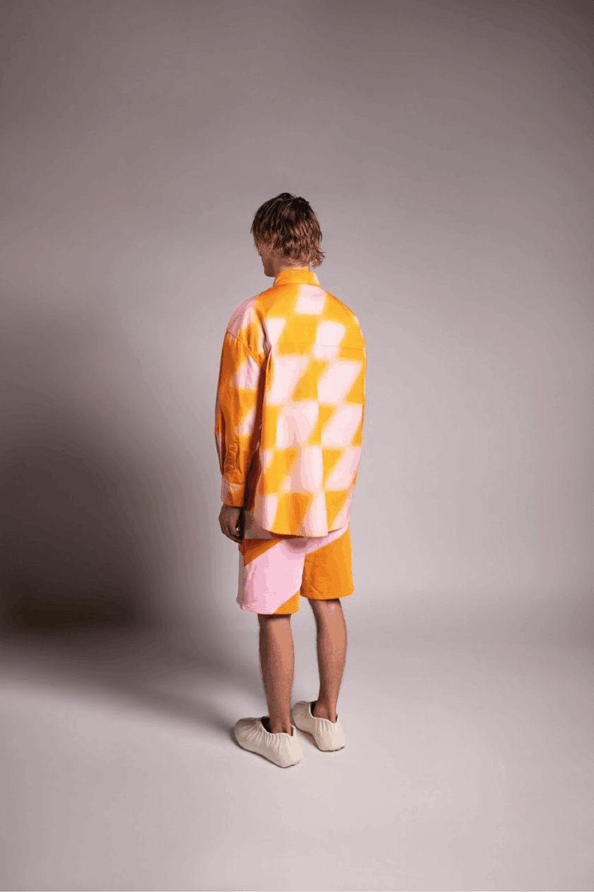 PRIVATE POLICY ORANGE AND PINK PXL CHECKER PIECING SHORTS