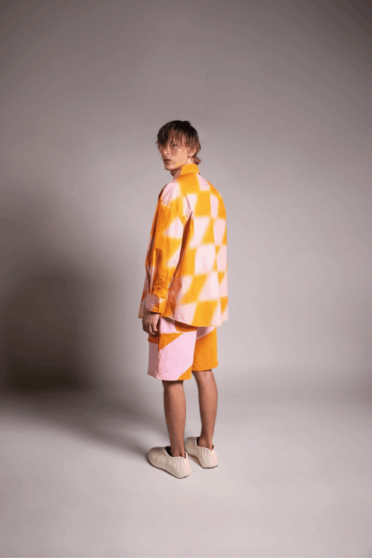 PRIVATE POLICY ORANGE AND PINK PXL CHECKER PIECING SHORTS