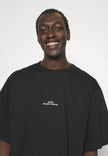 GCDS COLLEGE EMBROIDERED OVERSIZED T-SHIRT
