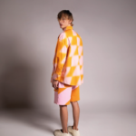 PRIVATE POLICY ORANGE AND PINK PXL CHECKER PIECING SHORTS