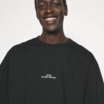 GCDS COLLEGE EMBROIDERED OVERSIZED T-SHIRT